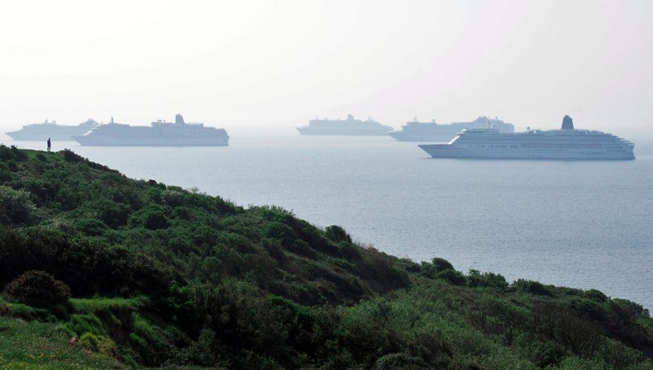 Cunard's Queen Victoria becomes the sixth cruise ship in Weymouth Bay, England