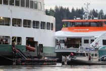Ferry carrying 596 passengers and 15 crew runs aground near Seattle WA