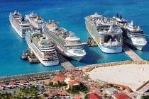 CDC lowers COVID warnings for cruise ships and Caribbean islands