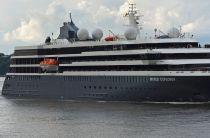 Quark Expeditions' World Explorer is the first to dock at Mykonos Island, Greece after 6 months
