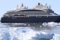 Two icebreakers - Ponant's Le Commandant Charcot and RRS Sir David Attenborough, working on an Antarctic channel