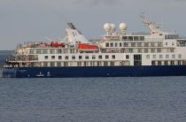 Ocean Explorer runs aground in Alpefjord within the National Park in East Greenland